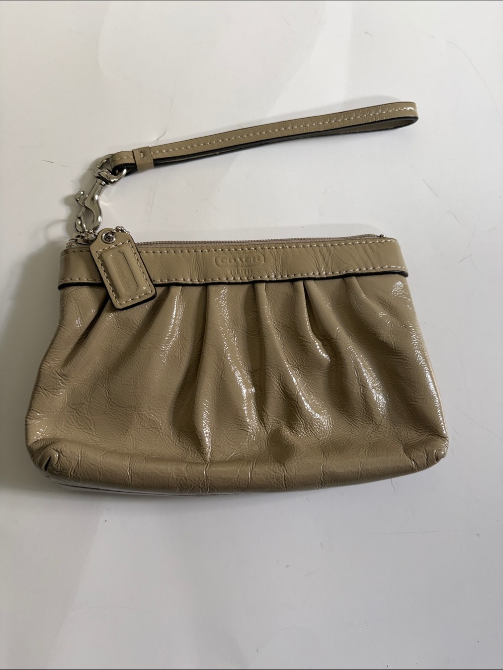 Coach Pebbled Leather Wristlet in Taupe